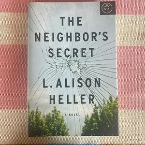 The Neighbor’s Secret - hard cover book